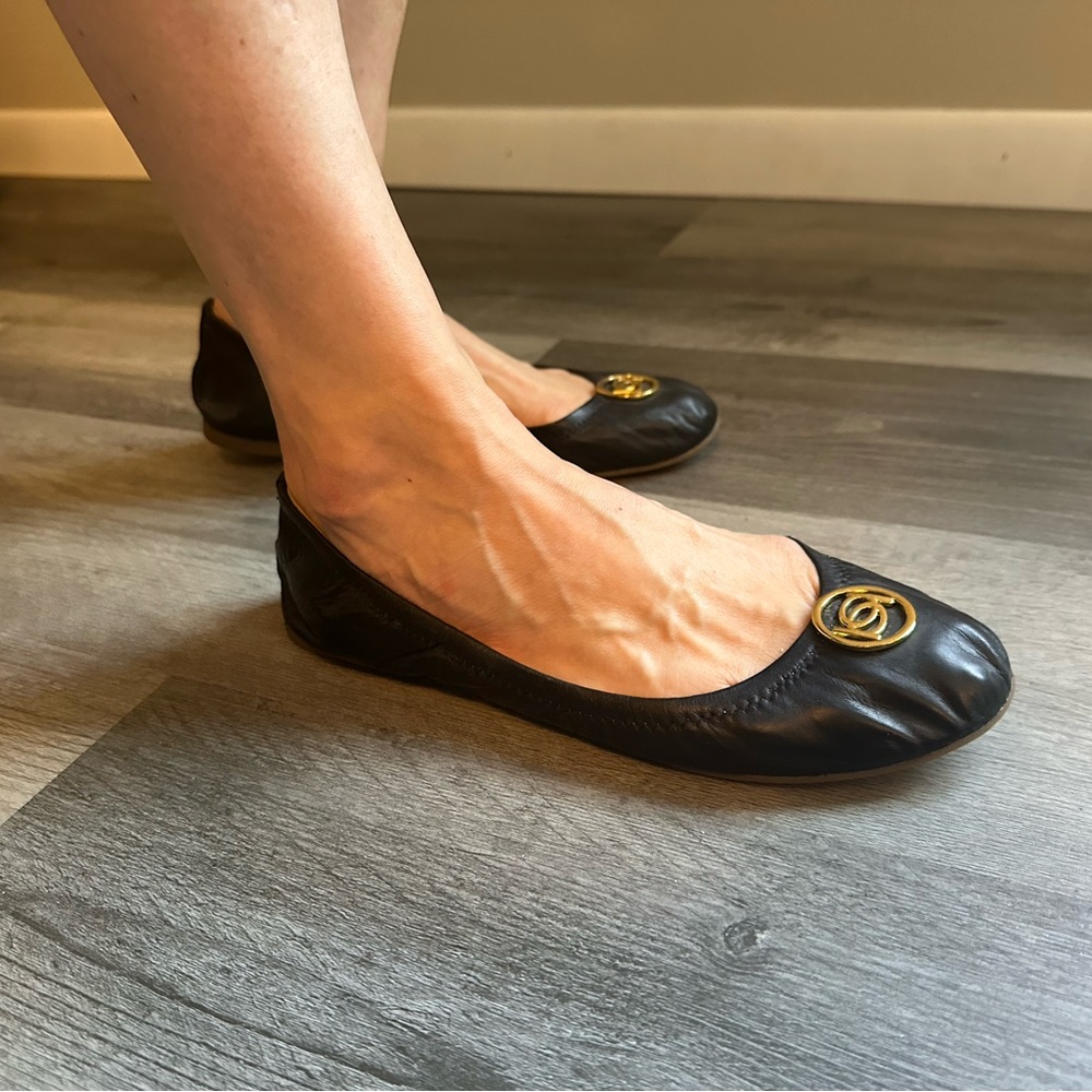Bebe Black and Gold Flats